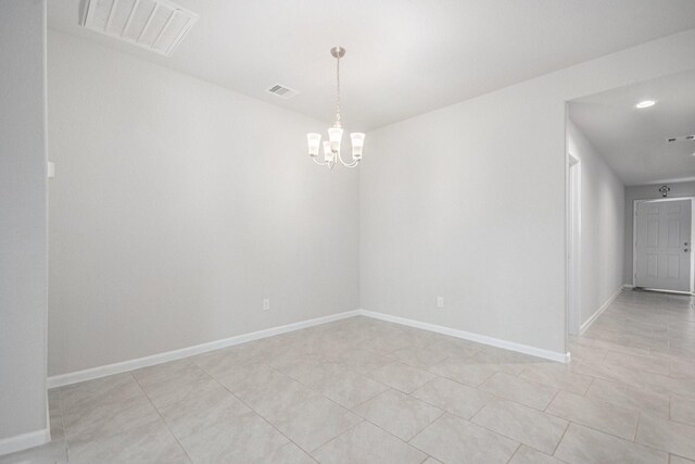 607 Harvest Bluff Dr, Rosharon, TX 77583 - spare room with a chandelier, light tile patterned floors, and baseboards