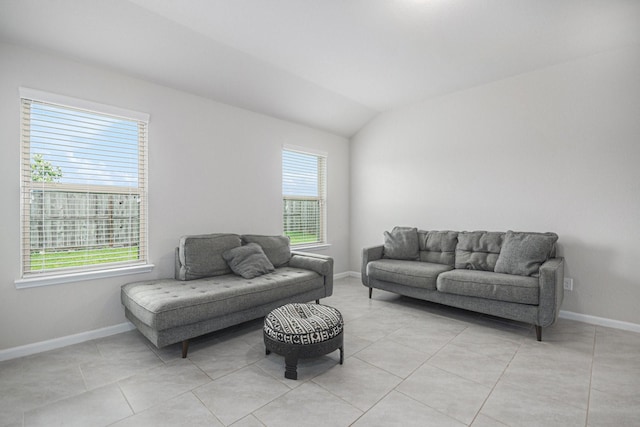 607 Harvest Bluff Dr, Rosharon, TX 77583 - living area featuring healthy amount of natural light, baseboards, vaulted ceiling, and light tile patterned floors
