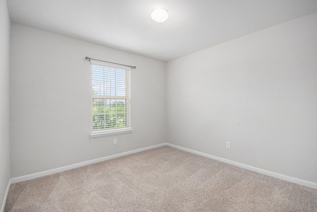 607 Harvest Bluff Dr, Rosharon, TX 77583 - carpeted spare room with baseboards