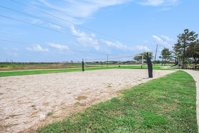607 Harvest Bluff Dr, Rosharon, TX 77583 - view of home's community with volleyball court and a lawn