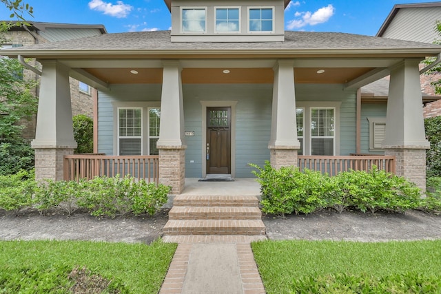 16819 Apple River Dr, Cypress, TX 77433 - doorway to property with a porch and roof with shingles