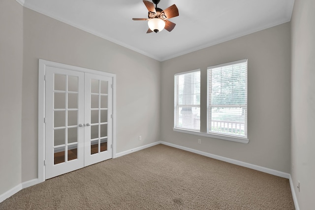 16819 Apple River Dr, Cypress, TX 77433 - carpeted empty room with baseboards, ceiling fan, crown molding, and french doors