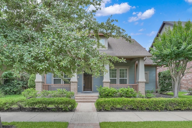16819 Apple River Dr, Cypress, TX 77433 - view of front of property featuring covered porch, roof with shingles, and brick siding