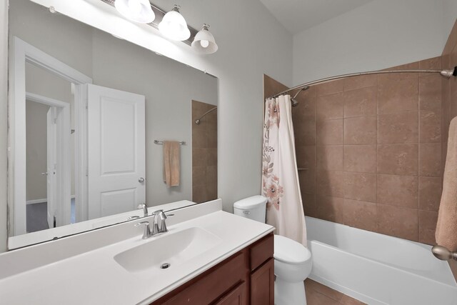 16819 Apple River Dr, Cypress, TX 77433 - bathroom featuring vanity, toilet, shower / tub combo, and tile patterned flooring