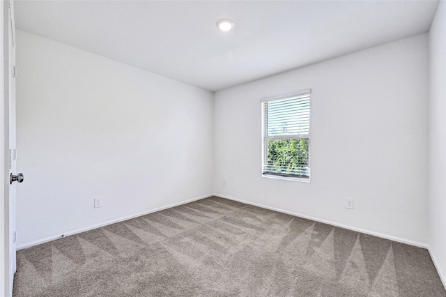 24027 Wandering Brook Dr, Hockley, TX 77447 - carpeted spare room with baseboards