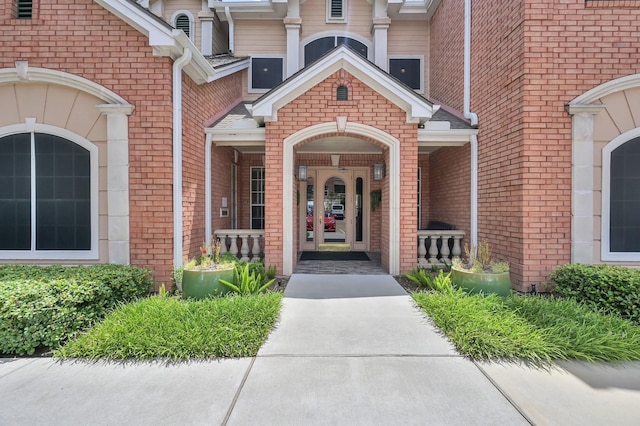 2100 Welch St Unit C309, Houston, TX 77019 - property entrance featuring brick siding