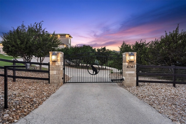 4810 R O Dr, Spicewood, TX 78669 - view of gate at dusk