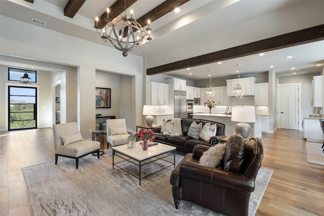 4810 R O Dr, Spicewood, TX 78669 - living area with beam ceiling, a chandelier, light wood-style floors, recessed lighting, and baseboards