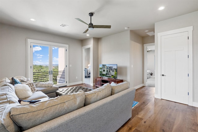 4810 R O Dr, Spicewood, TX 78669 - living area featuring baseboards, wood finished floors, recessed lighting, a ceiling fan, and french doors