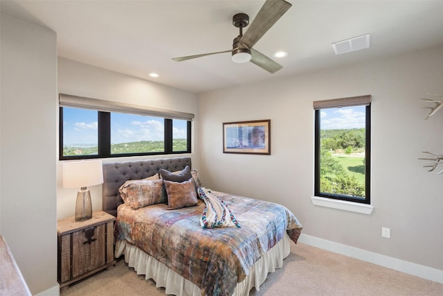 4810 R O Dr, Spicewood, TX 78669 - bedroom with light colored carpet, recessed lighting, baseboards, and ceiling fan