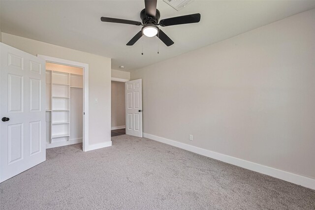 5032 Briscoe St, Houston, TX 77033 - unfurnished bedroom featuring carpet flooring, baseboards, a ceiling fan, and a closet