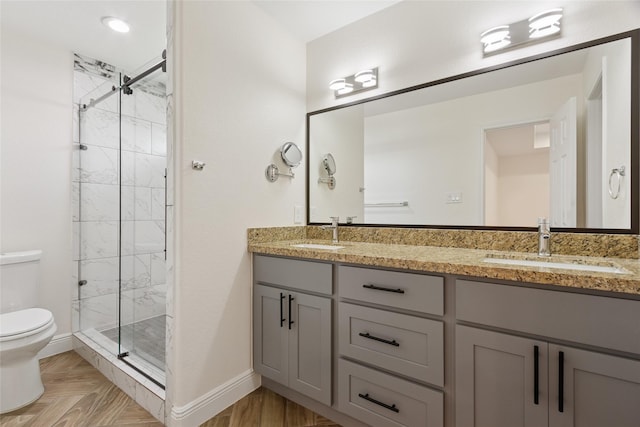 902 Lucky St, Houston, TX 77088 - bathroom with toilet, baseboards, a marble finish shower, and double vanity
