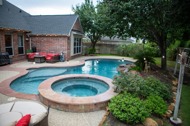 13926 Wessex Park Dr, Cypress, TX 77429 - view of pool with a patio area, outdoor lounge area, a fenced backyard, and a pool with connected hot tub