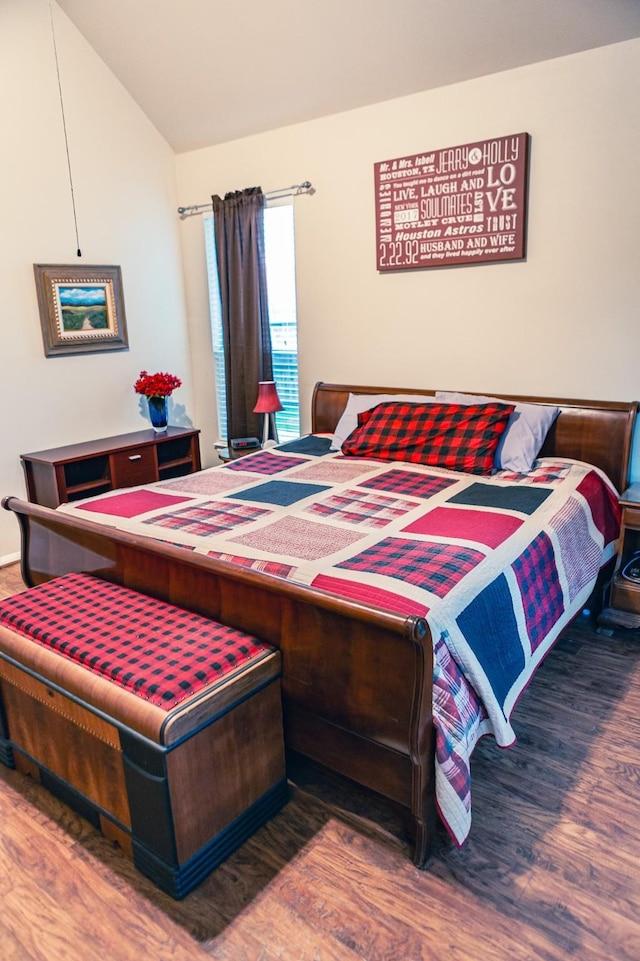 13926 Wessex Park Dr, Cypress, TX 77429 - bedroom with wood finished floors and vaulted ceiling