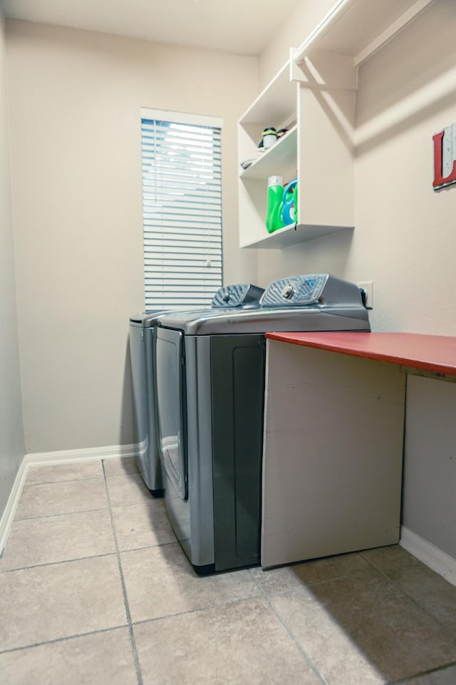 13926 Wessex Park Dr, Cypress, TX 77429 - washroom featuring washer and dryer and light tile patterned floors