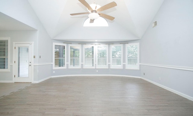 15915 Angler Bend Dr, Houston, TX 77044 - empty room with wood finished floors, a ceiling fan, lofted ceiling, and baseboards