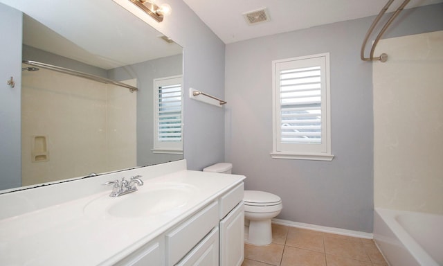15915 Angler Bend Dr, Houston, TX 77044 - bathroom featuring plenty of natural light, vanity, toilet, and baseboards