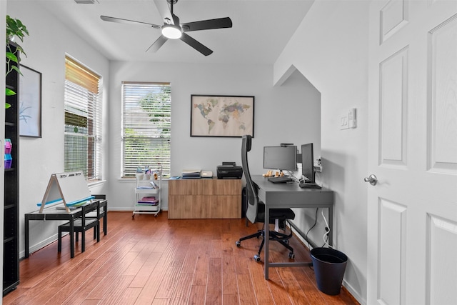 21519 Canyon Terrace Ln, Katy, TX 77450 - office featuring wood finished floors, a ceiling fan, and baseboards