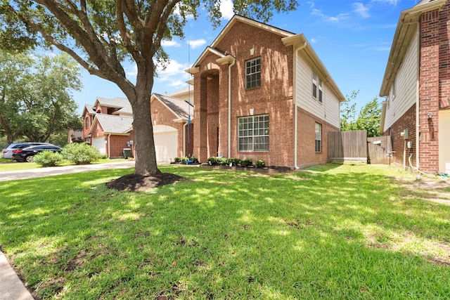 21519 Canyon Terrace Ln, Katy, TX 77450 - traditional home with brick siding, an attached garage, and driveway