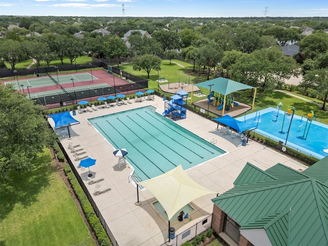 21519 Canyon Terrace Ln, Katy, TX 77450 - drone / aerial view of a tree filled landscape and a pool