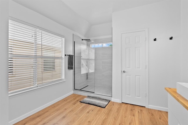 21519 Canyon Terrace Ln, Katy, TX 77450 - full bath with walk in shower, wood finished floors, and baseboards