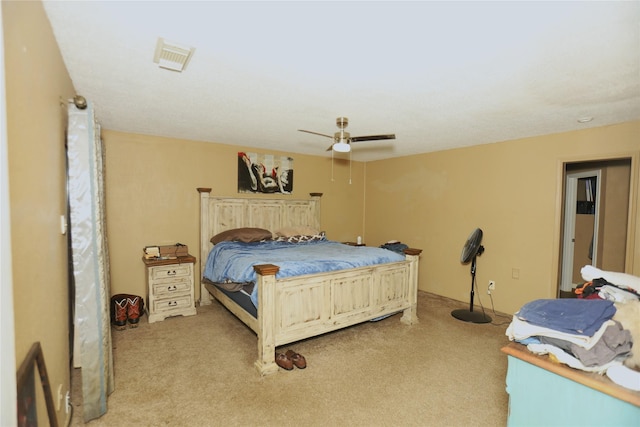 2236 River Oaks Dr, West Columbia, TX 77486 - bedroom with light colored carpet and a ceiling fan
