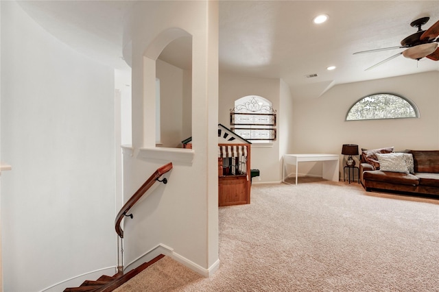 21622 Sabine Pass Ct, Katy, TX 77450 - corridor featuring healthy amount of natural light, carpet floors, arched walkways, and recessed lighting