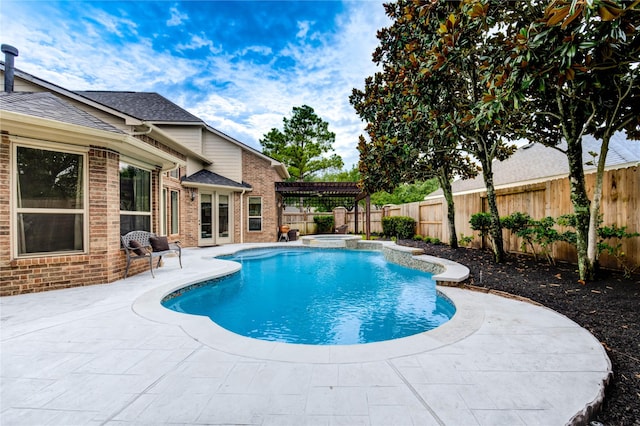 21622 Sabine Pass Ct, Katy, TX 77450 - view of pool featuring a fenced backyard, a patio area, a pool with connected hot tub, and a pergola