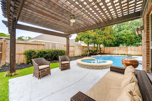 21622 Sabine Pass Ct, Katy, TX 77450 - fenced backyard with a pergola, a ceiling fan, a pool with connected hot tub, and a patio area
