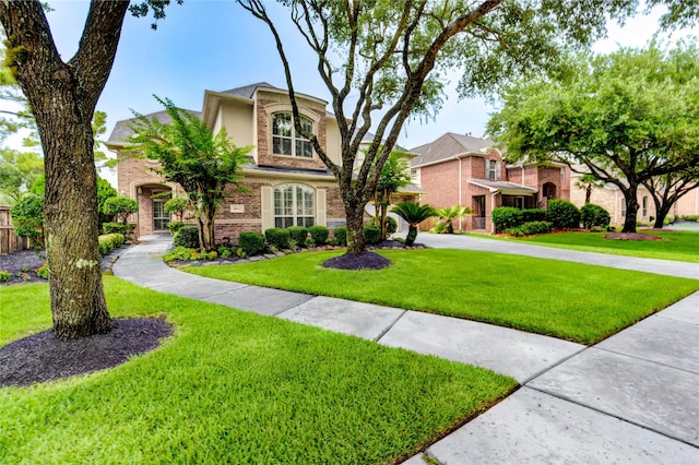 21622 Sabine Pass Ct, Katy, TX 77450 - traditional home with brick siding and a front yard