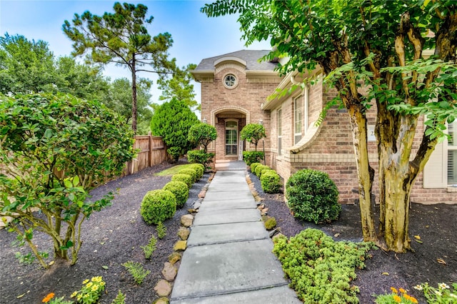 21622 Sabine Pass Ct, Katy, TX 77450 - french country inspired facade with brick siding and a shingled roof