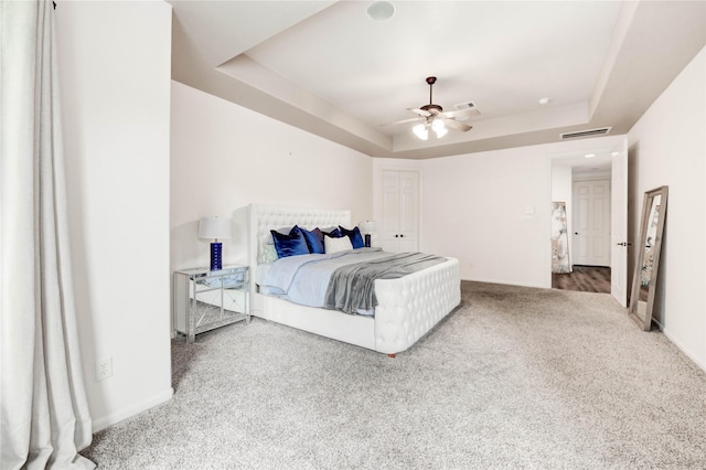 21622 Sabine Pass Ct, Katy, TX 77450 - bedroom featuring a raised ceiling, carpet, and ceiling fan