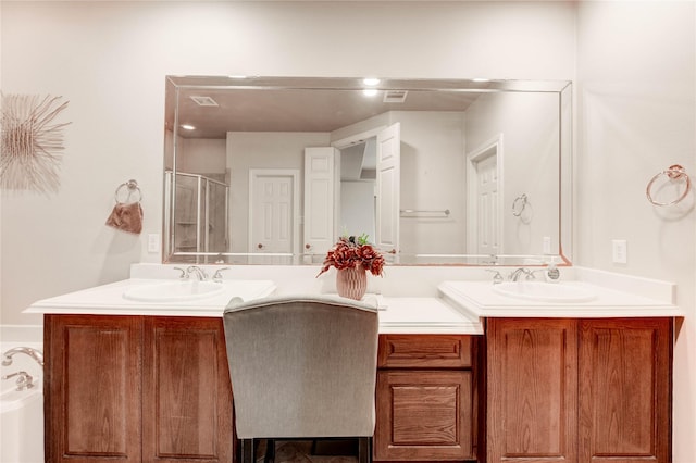 21622 Sabine Pass Ct, Katy, TX 77450 - full bathroom featuring double vanity, a stall shower, and a bath