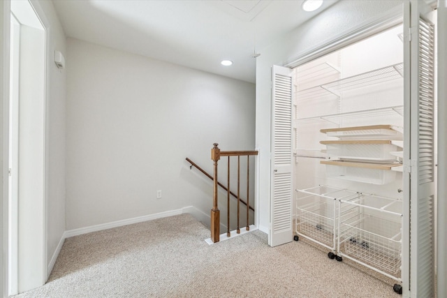 701 Bering Dr Unit 1702, Houston, TX 77057 - hall featuring an upstairs landing, carpet flooring, baseboards, and recessed lighting