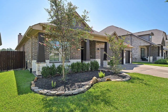 10315 Silver Shield Way, Tomball, TX 77375 - view of front of house with concrete driveway, brick siding, a chimney, and a garage
