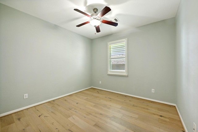 10315 Silver Shield Way, Tomball, TX 77375 - empty room with a ceiling fan, wood-type flooring, and baseboards