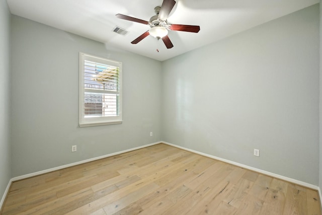10315 Silver Shield Way, Tomball, TX 77375 - unfurnished room featuring hardwood / wood-style flooring, ceiling fan, and baseboards