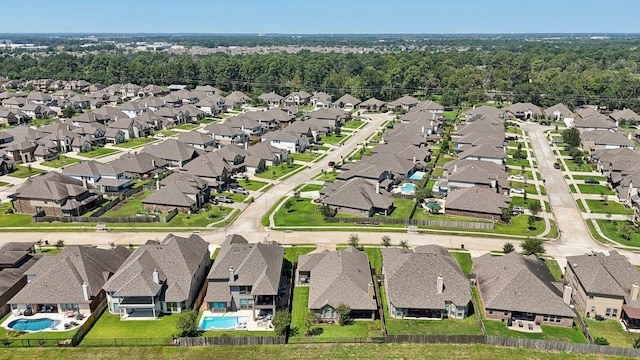 10315 Silver Shield Way, Tomball, TX 77375 - view of property location with a pool and nearby suburban area