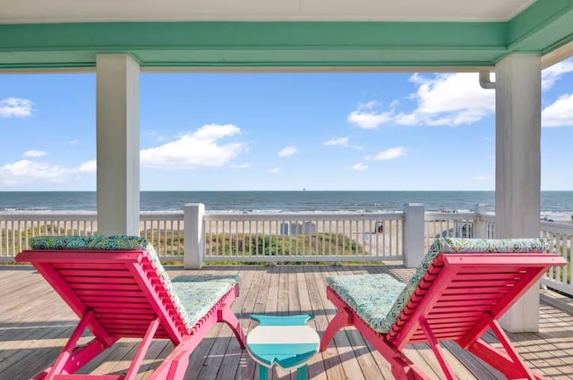 852 W Lazy Ln, Crystal Beach, TX 77650 - wooden terrace with view of water and beach