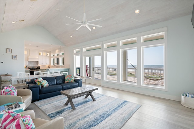 852 W Lazy Ln, Crystal Beach, TX 77650 - living area with ceiling fan, light wood finished floors, high vaulted ceiling, and recessed lighting