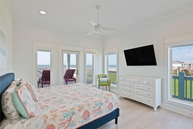 852 W Lazy Ln, Crystal Beach, TX 77650 - bedroom featuring access to outside, crown molding, multiple windows, light wood-type flooring, and recessed lighting