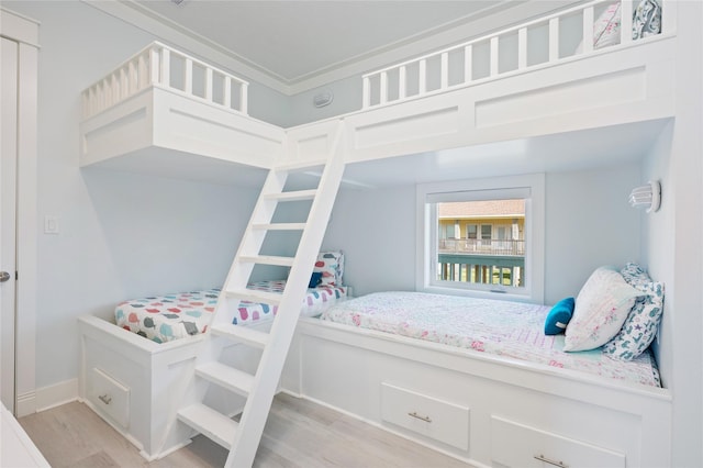 852 W Lazy Ln, Crystal Beach, TX 77650 - bedroom featuring wood finished floors