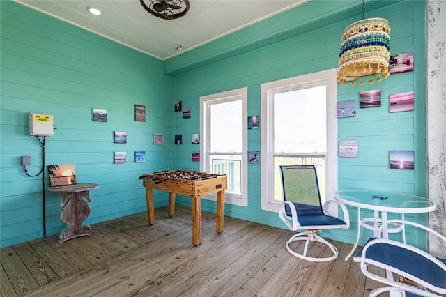 852 W Lazy Ln, Crystal Beach, TX 77650 - game room with wood-type flooring and wooden walls