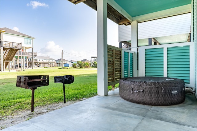852 W Lazy Ln, Crystal Beach, TX 77650 - view of patio featuring a residential view