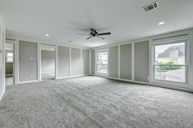 1406 Rustic Knolls Dr, Katy, TX 77450 - carpeted spare room featuring a ceiling fan and recessed lighting