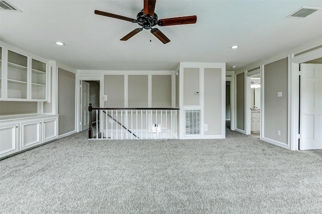 1406 Rustic Knolls Dr, Katy, TX 77450 - spare room with carpet, a ceiling fan, and recessed lighting