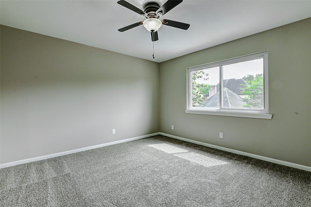 1406 Rustic Knolls Dr, Katy, TX 77450 - carpeted empty room with baseboards and a ceiling fan