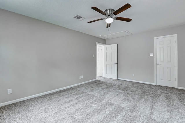 1406 Rustic Knolls Dr, Katy, TX 77450 - unfurnished bedroom featuring attic access, carpet flooring, and a ceiling fan