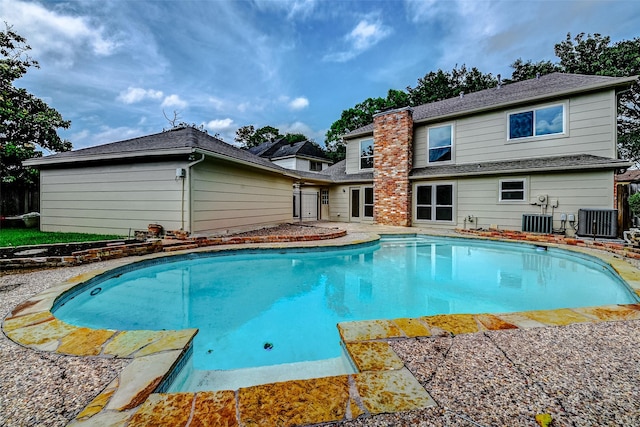 1406 Rustic Knolls Dr, Katy, TX 77450 - swimming pool with central air condition unit