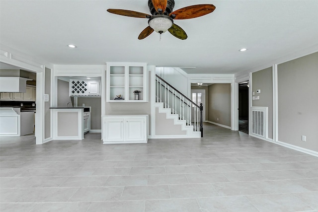 1406 Rustic Knolls Dr, Katy, TX 77450 - unfurnished living room with stairway, a ceiling fan, recessed lighting, and light tile patterned floors